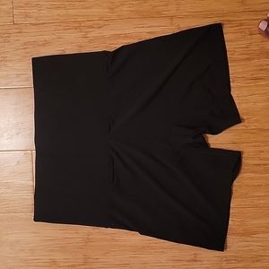 Shape wear shorts with extra wide waist band.